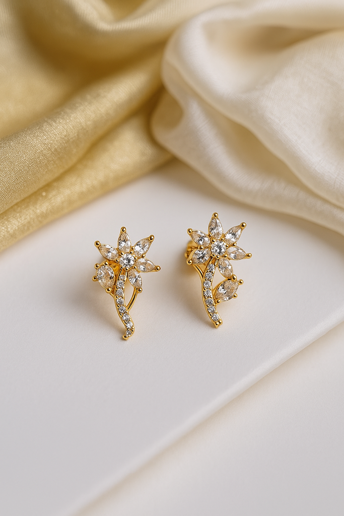 Emerald Petal Studs: Highlights the white stone and the floral shape.